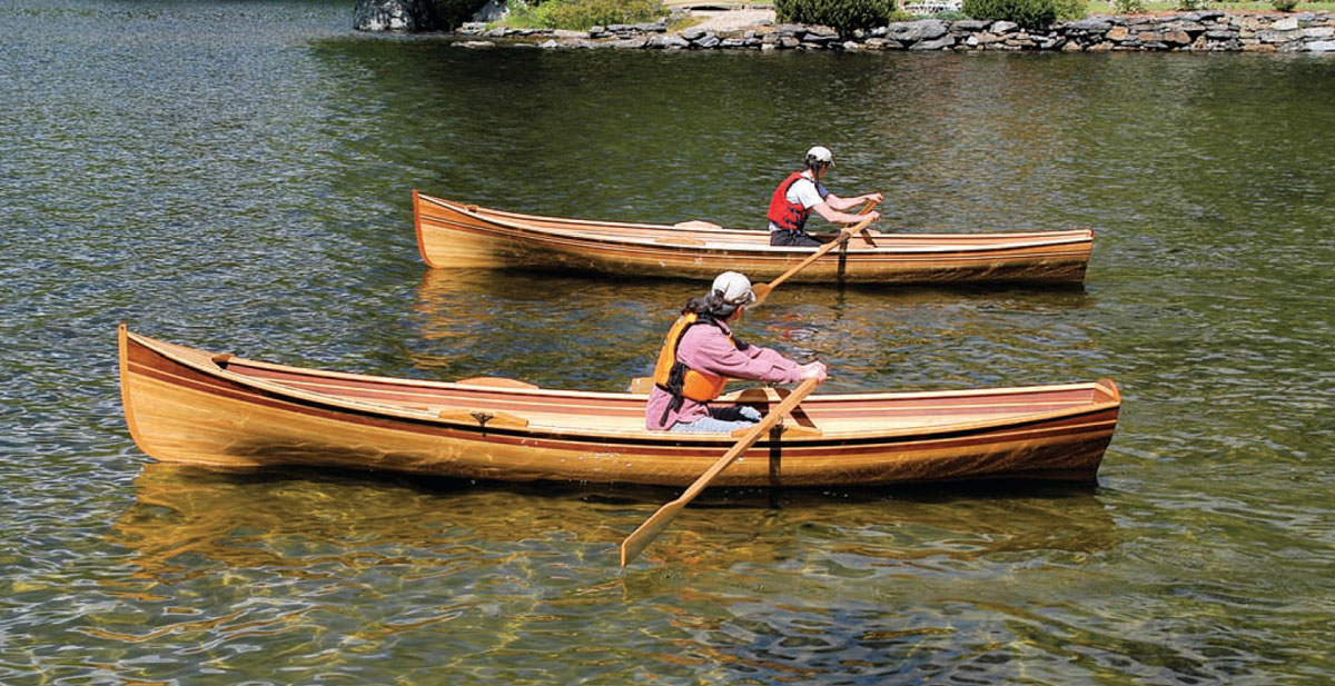 Two boaters row their Newfound Rangeleys side-by-side.