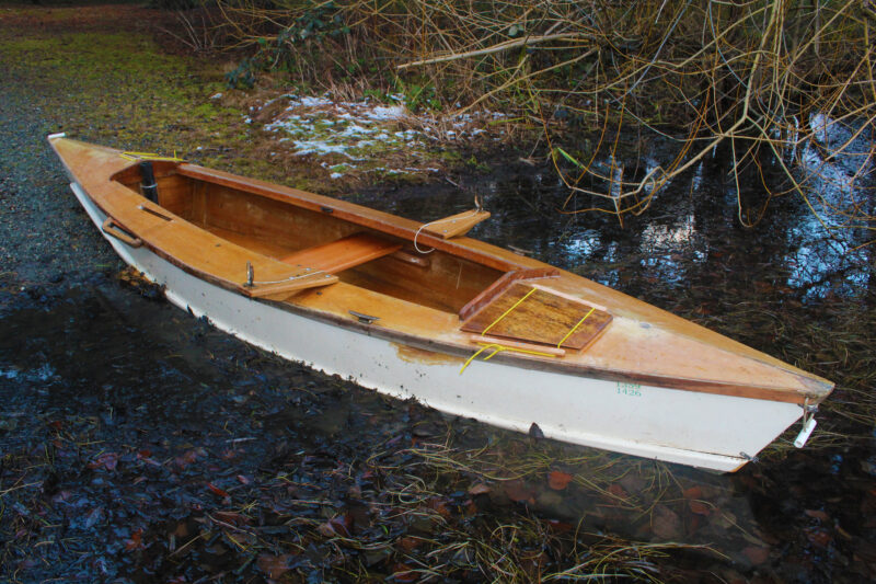 Bolger pirogue in marshy water—a worthy free boat to save