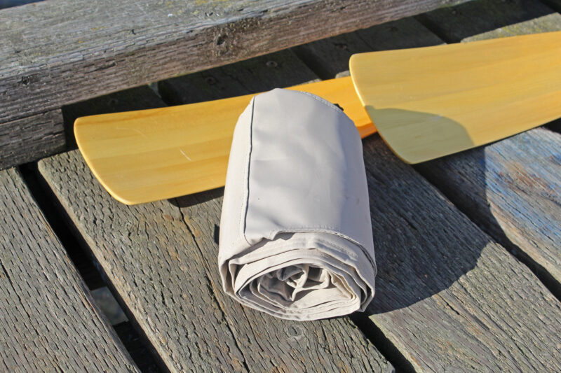 Canvas oar bag rolled up for stowing