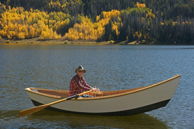 Headwater 14 driftboat with single oarsman.