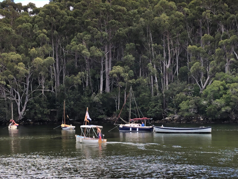 Boats in the TN25 fleet at anchor in Catamaran River, Tasmania