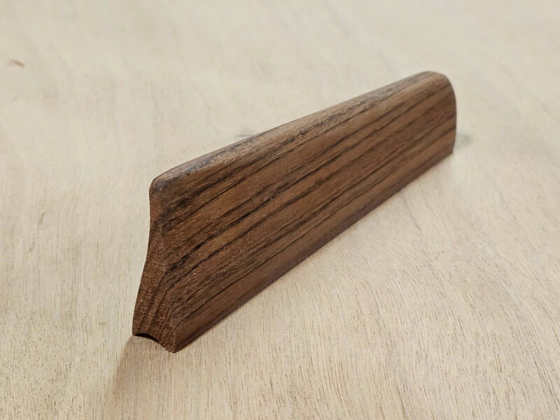 A hardwood skeg to be fitted to a kayak