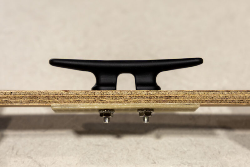 A custom backing plate made with fiberglass and epoxy.