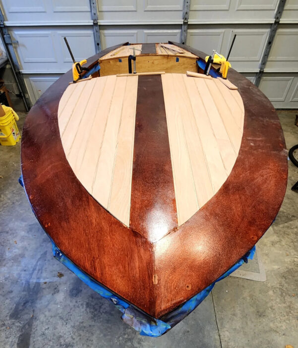 Contrasting mahogany and mahogany ply in a foredeck.