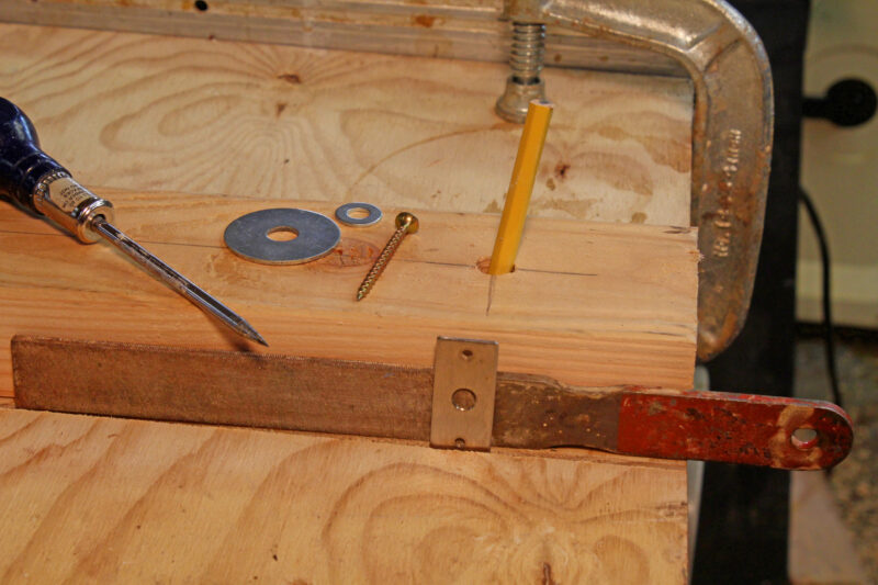 Setting up an infeed fence on a table saw.