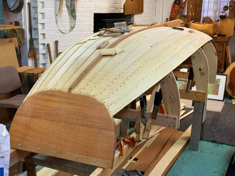 Planking up a lapstrake pram dinghy.