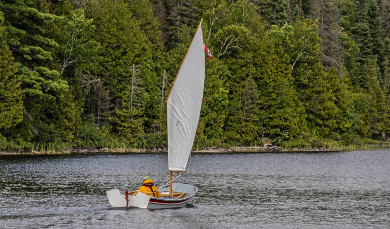 Oonagh pram dinghy sailing downwind.