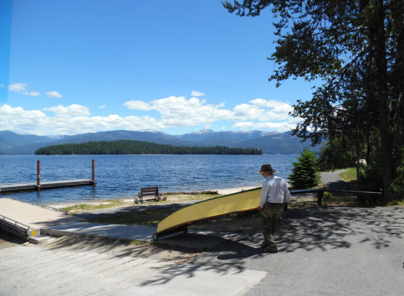 A man pulls a boat up the ramp at Kalispell, Priest Lake, Idaho.