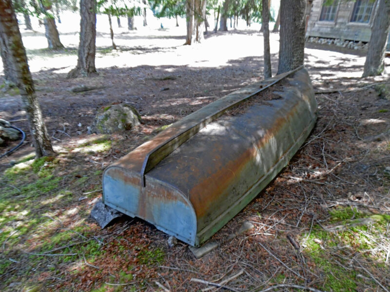 Upturned metal boat near Vinther-Nelson cabin on Eight Mile Island.