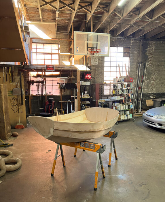 Nutshell Pram under construction in workshop.