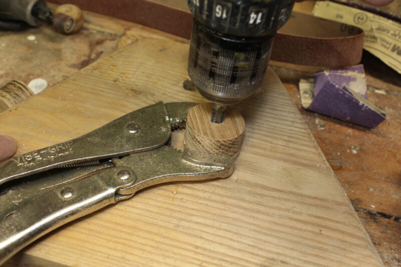 Holding a wooden plug steady in Vise Grip.