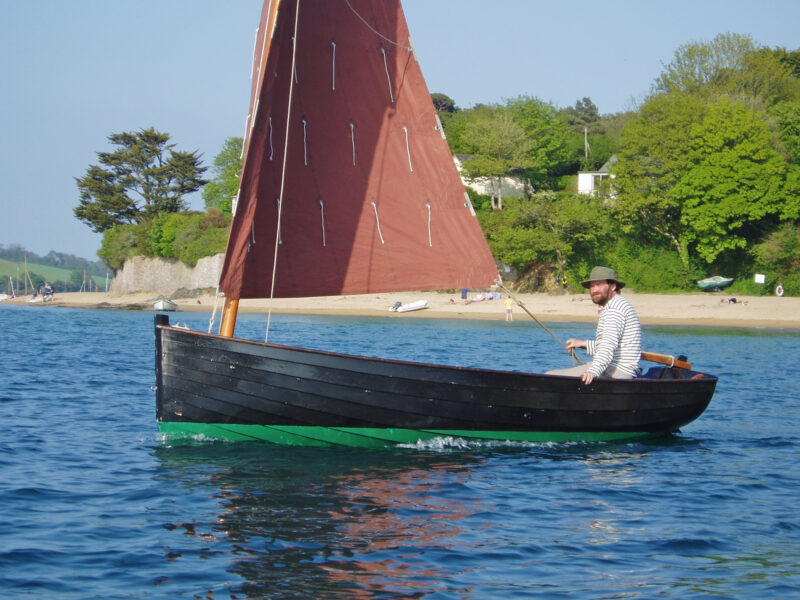 Roger Barnes sailing Ilur, AVEL DRO, on a sunny day.