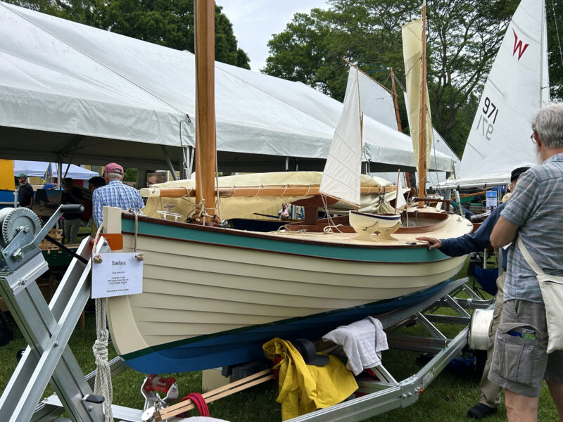 Doug Hylan–designed Siri on a trailer with model boat on the side deck.